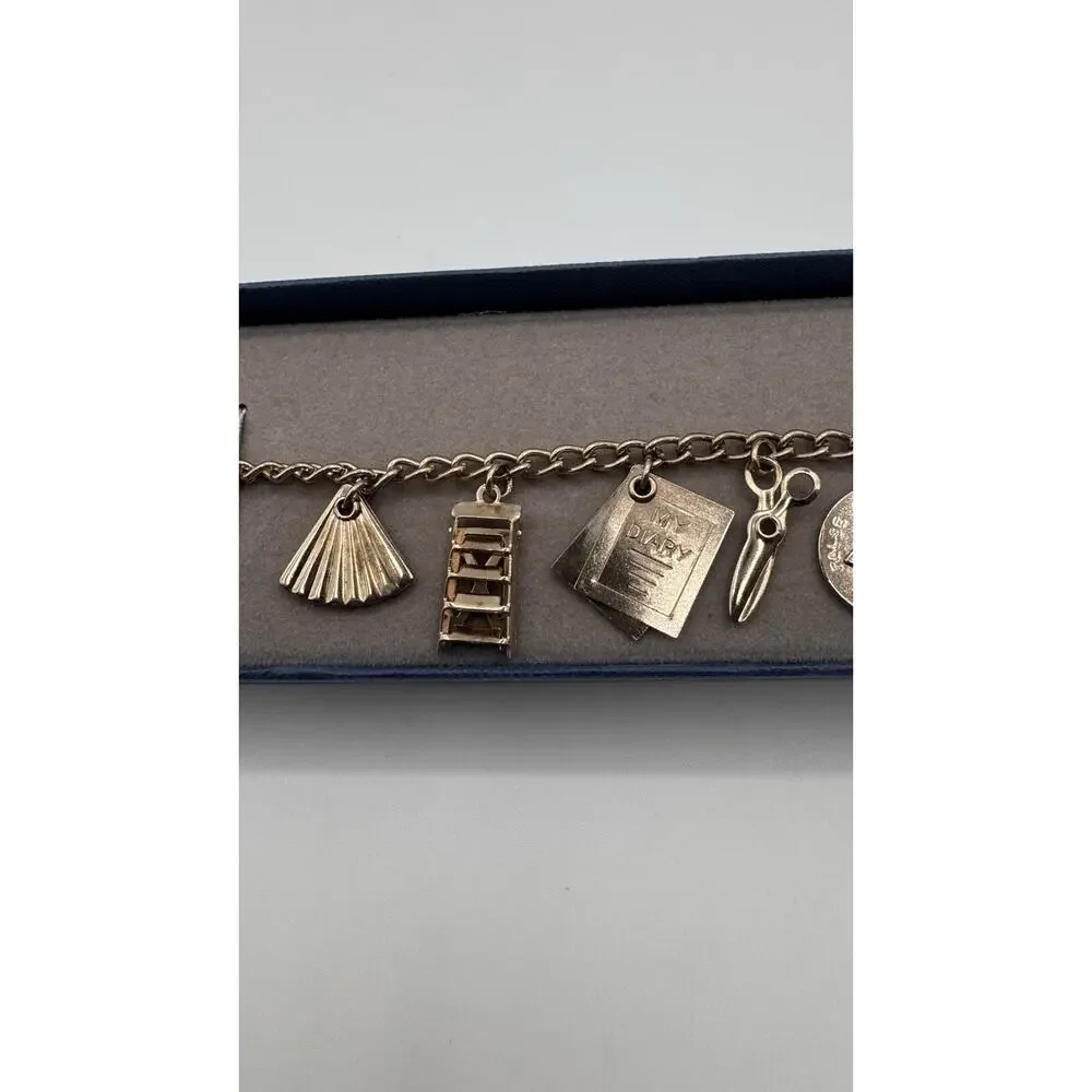 Vintage Silvertone Bracelet Ten Charms Movable Scissors Stair Chair Lie Detector